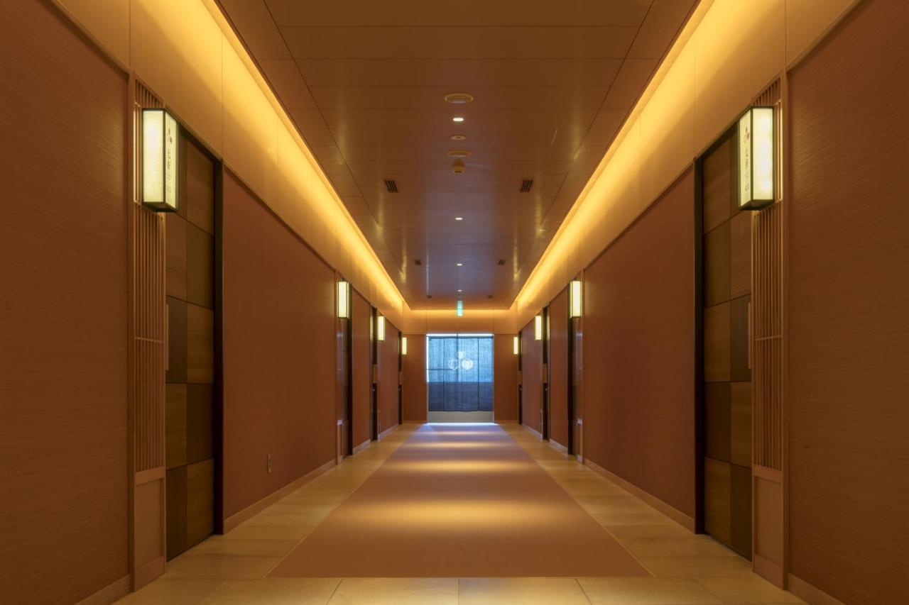 Okuhita Onsen Umehibiki Hotel Bagian luar foto