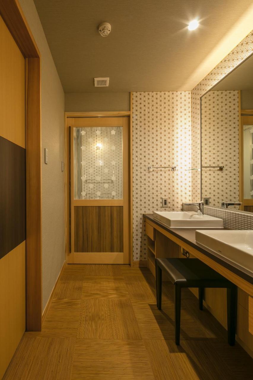 Okuhita Onsen Umehibiki Hotel Bagian luar foto