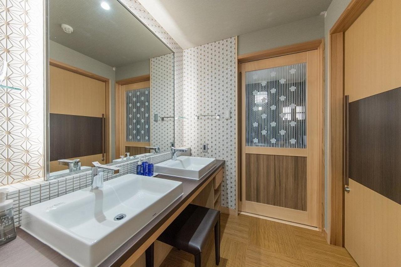 Okuhita Onsen Umehibiki Hotel Bagian luar foto