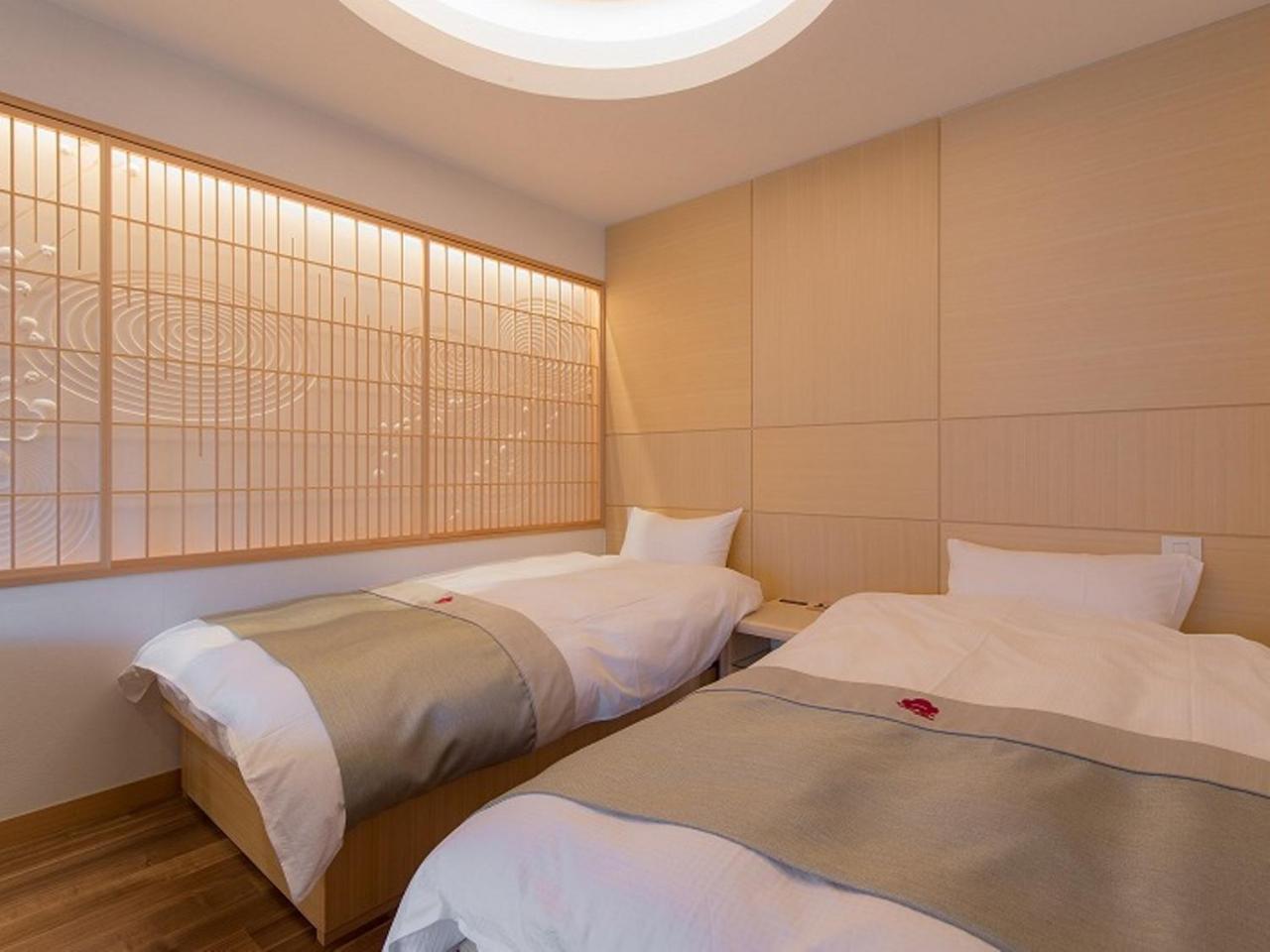 Okuhita Onsen Umehibiki Hotel Bagian luar foto