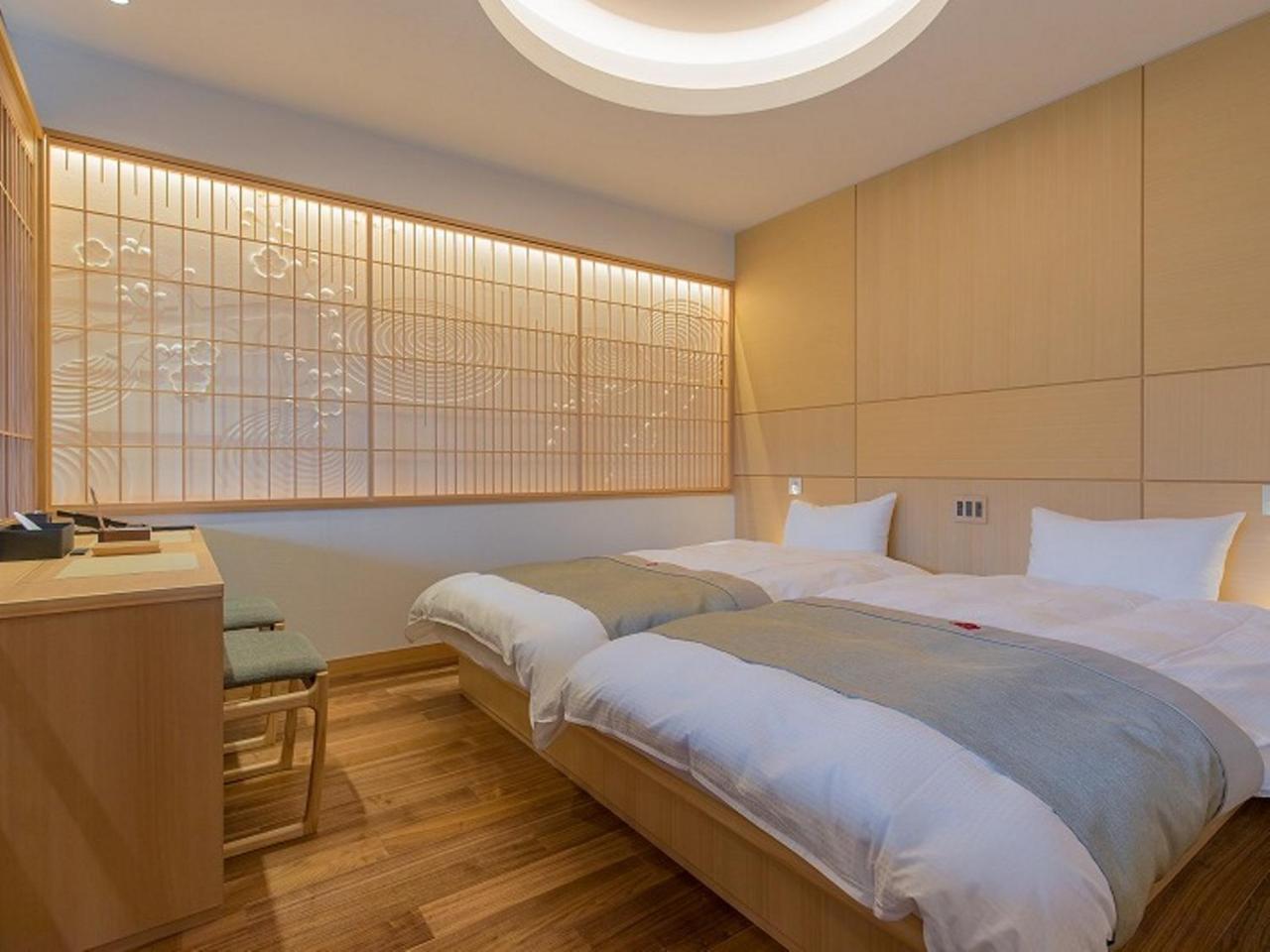Okuhita Onsen Umehibiki Hotel Bagian luar foto