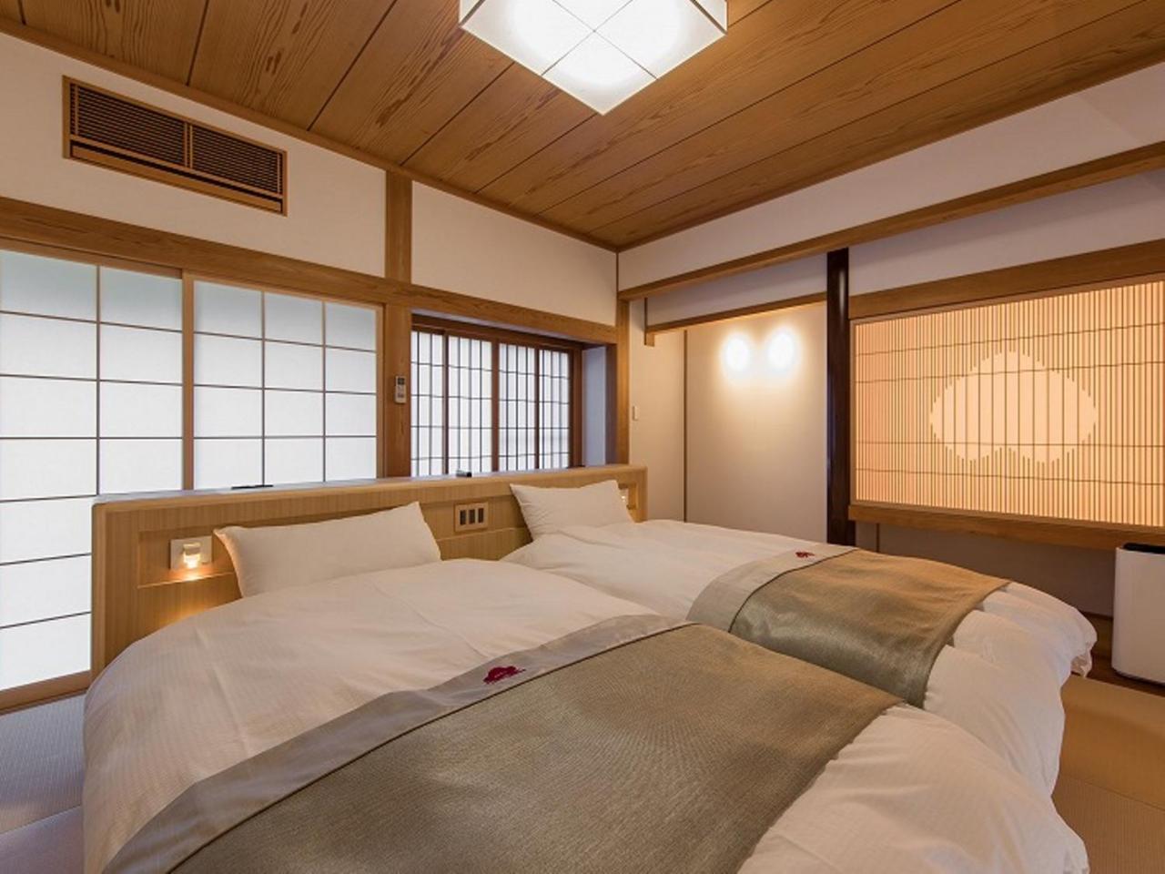 Okuhita Onsen Umehibiki Hotel Bagian luar foto